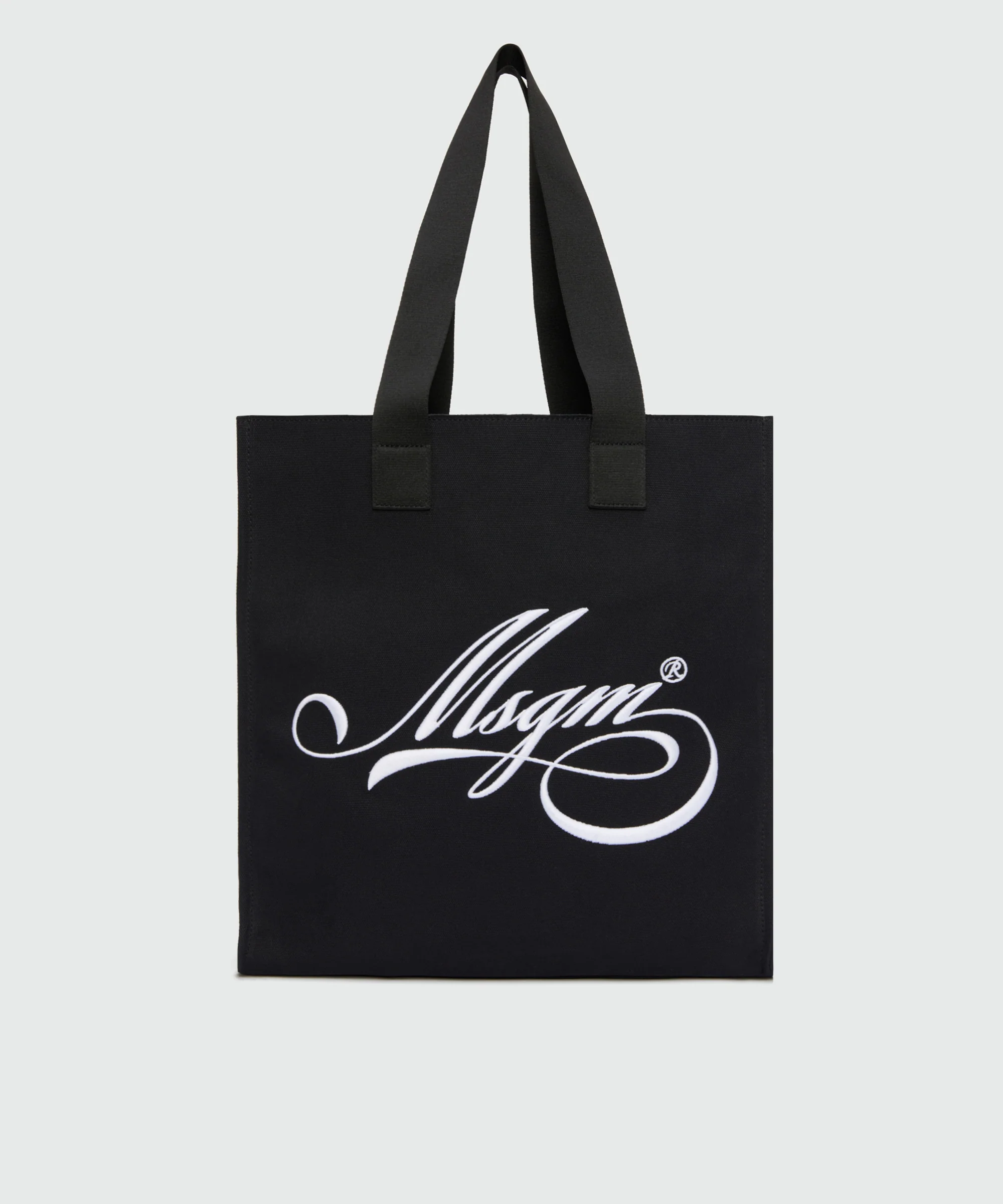 Black canvas tote with white cursive MSGM logo