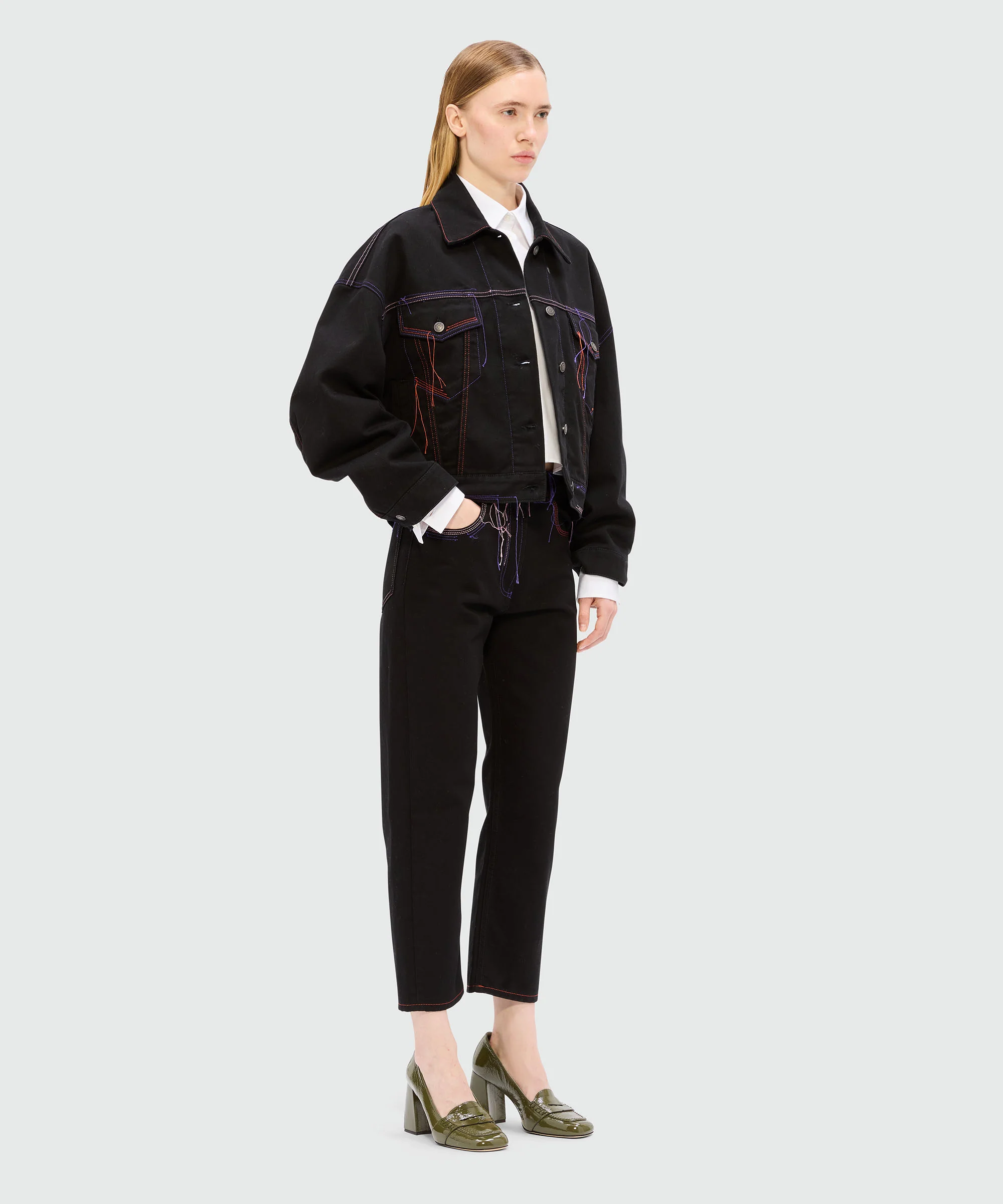 Black denim jacket with multi-colored stitching and threads - Image 4