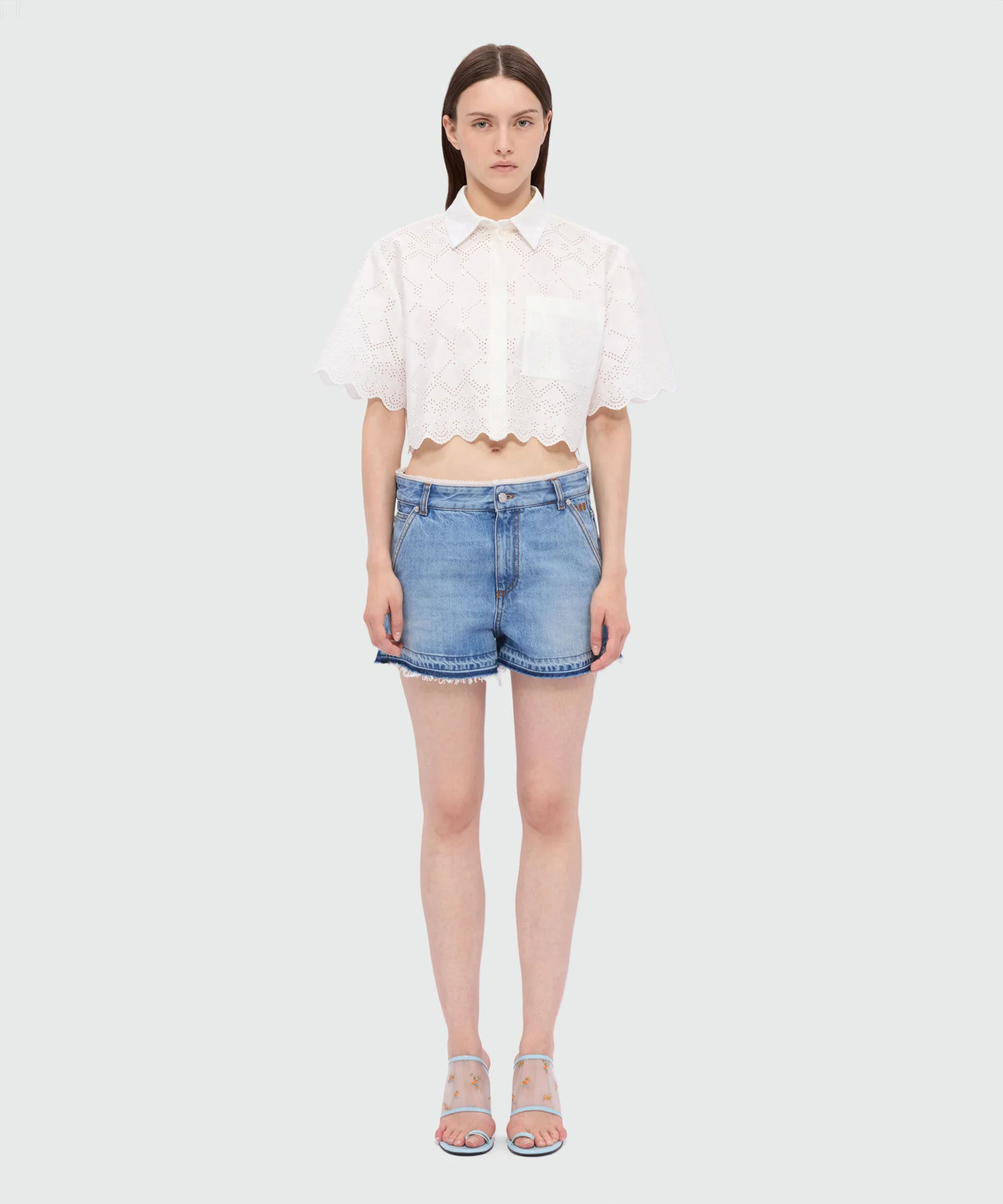 Light blue stone-washed denim shorts with lace detail at the waist - Image 2