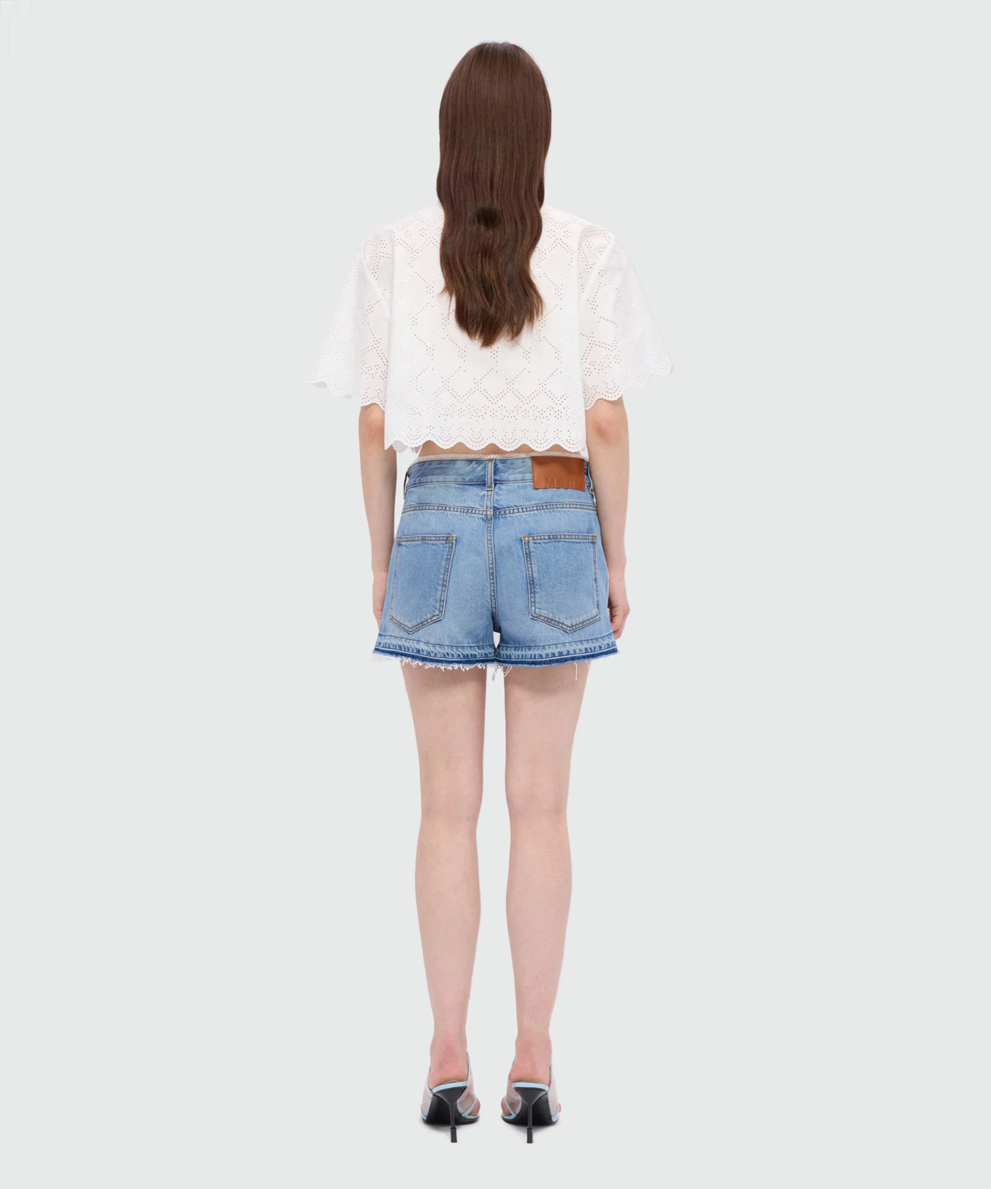 Light blue stone-washed denim shorts with lace detail at the waist - Image 3