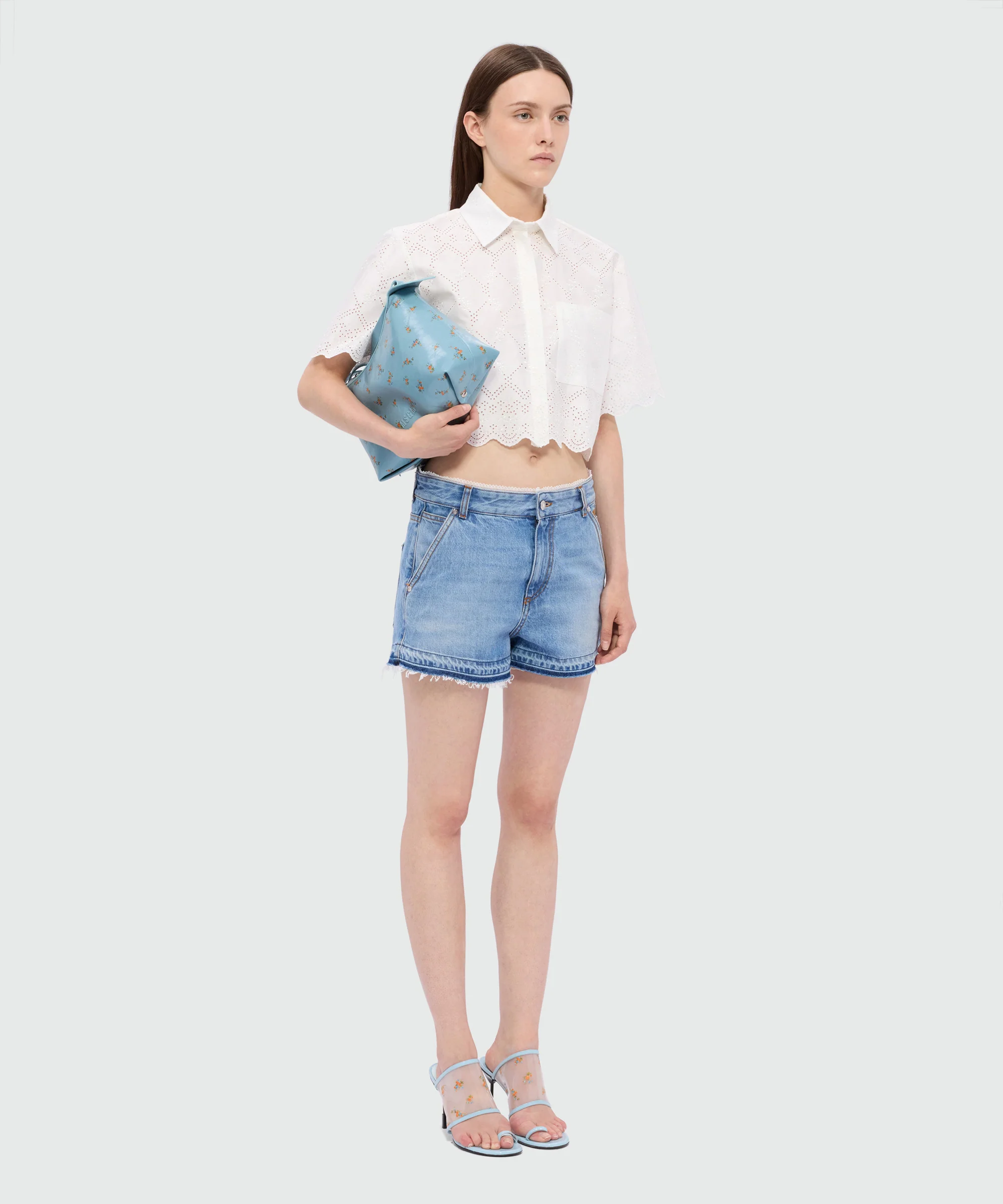 Light blue stone-washed denim shorts with lace detail at the waist - Image 4