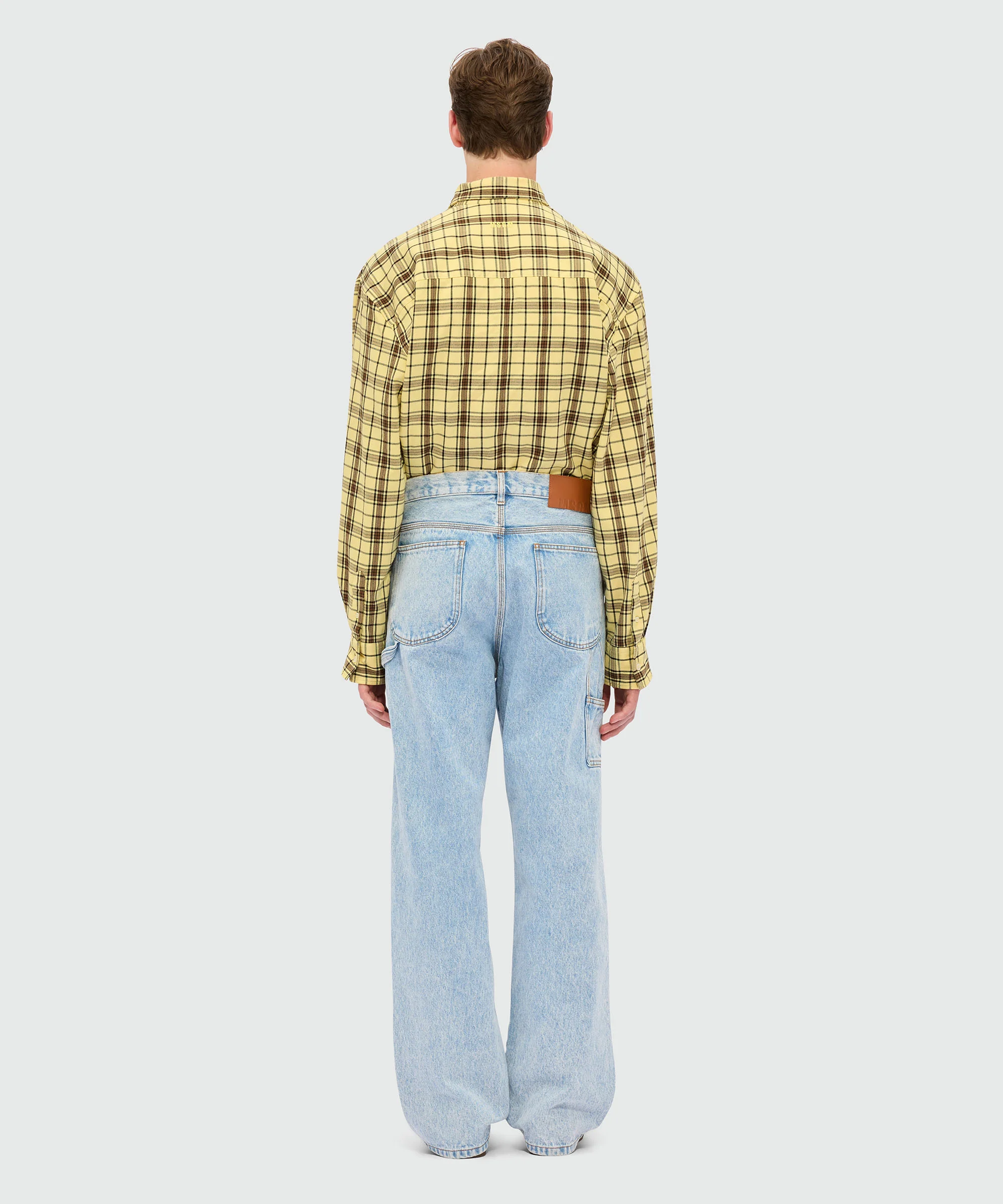 Light denim trousers with a marbled effect - Image 3