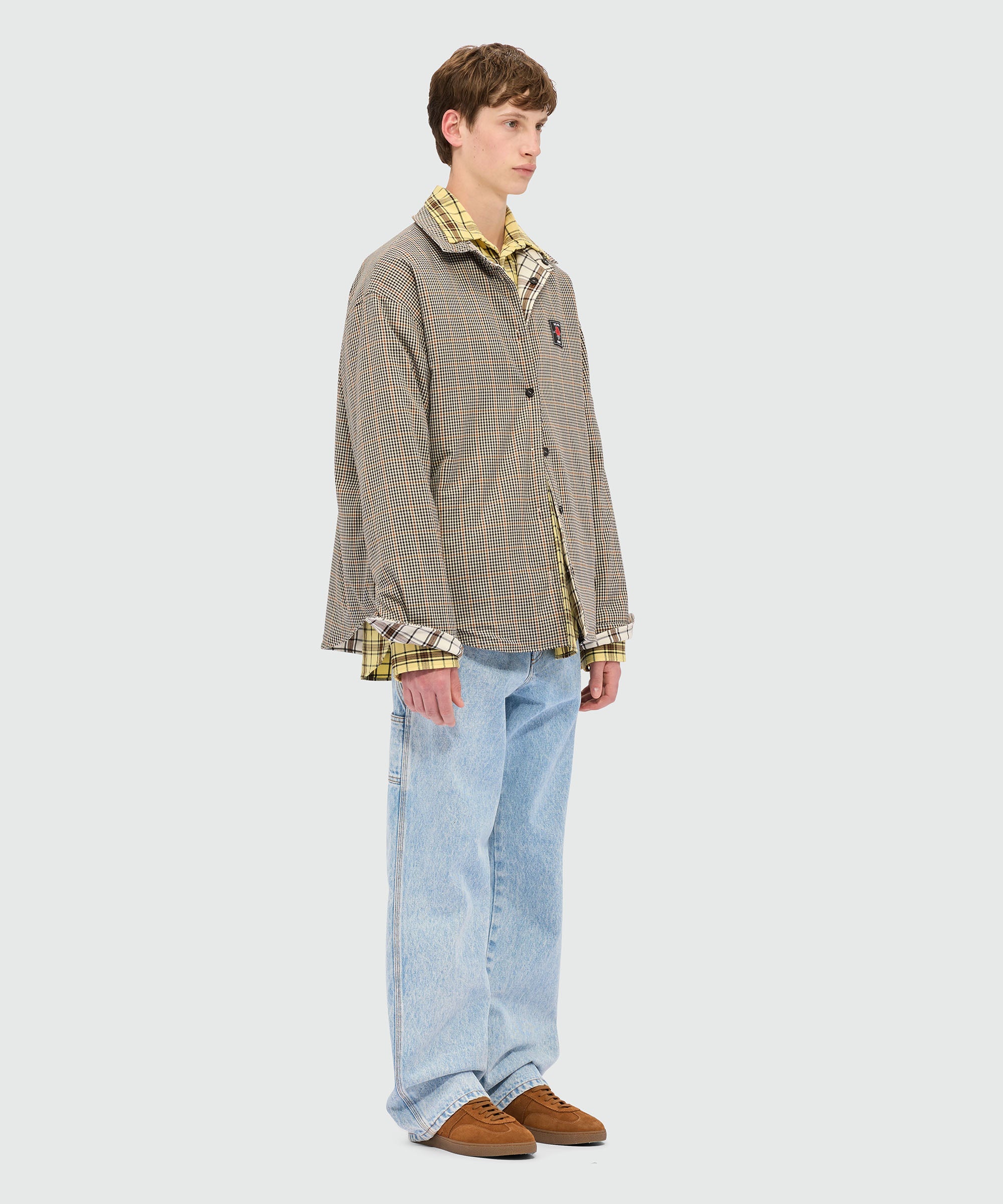Light denim trousers with a marbled effect - Image 4